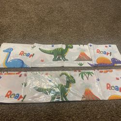 Two Dinosaur Table Covers