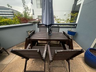 Dark Brown Wood Outdoor Table and Chair Set
