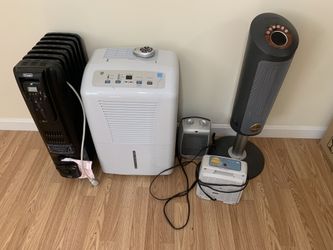 Several space heaters & Humidifier/Dehumidifier