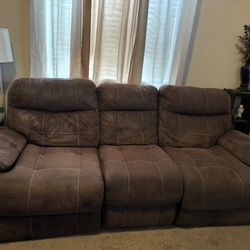 Brown suede double recliner couch