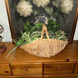 Weaven basket with fake greenery 