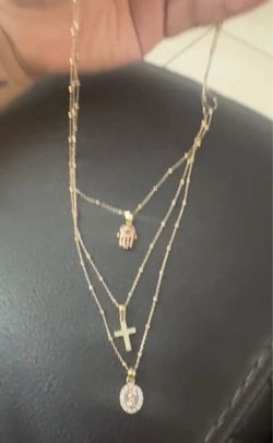 Gold necklace it's three and one