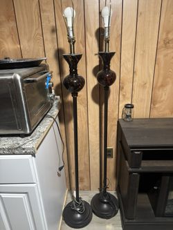 pair of metal and Glass standing lamps