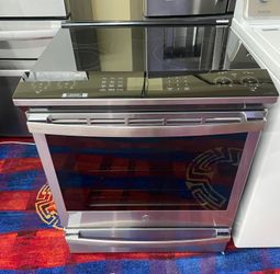 Ge slide in range stainless steel