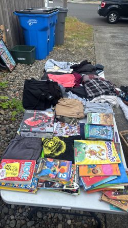 Lots of books and boys clothes  and shoes