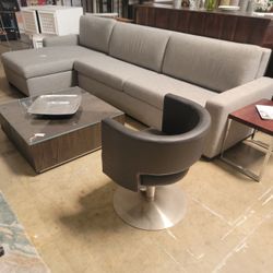 RH Maxwell king sleeper sectional with left-arm chaise and built-in storage.