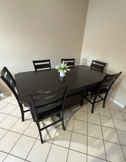Dining table with storage and chairs