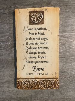 Love Never Fails Decorative Wall Plaque