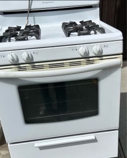 Frigidaire 30” freestanding gas stove, 4 burners. W oven