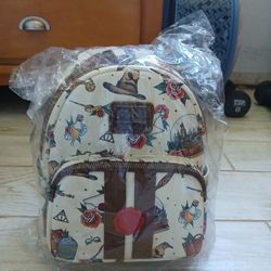 BRAND NEW. NEVER USED. HP Loungefly MINI Bag