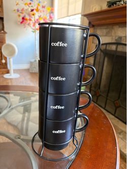 4 coffee cups in holder