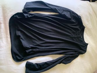 Black is large and tan is XL shirts make a offer