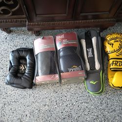 Boxing Head Gear Muay Thai Gloves And 2 Pairs Of Everlast Shim Guards.