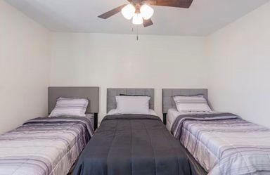 Three twin beds with mattress