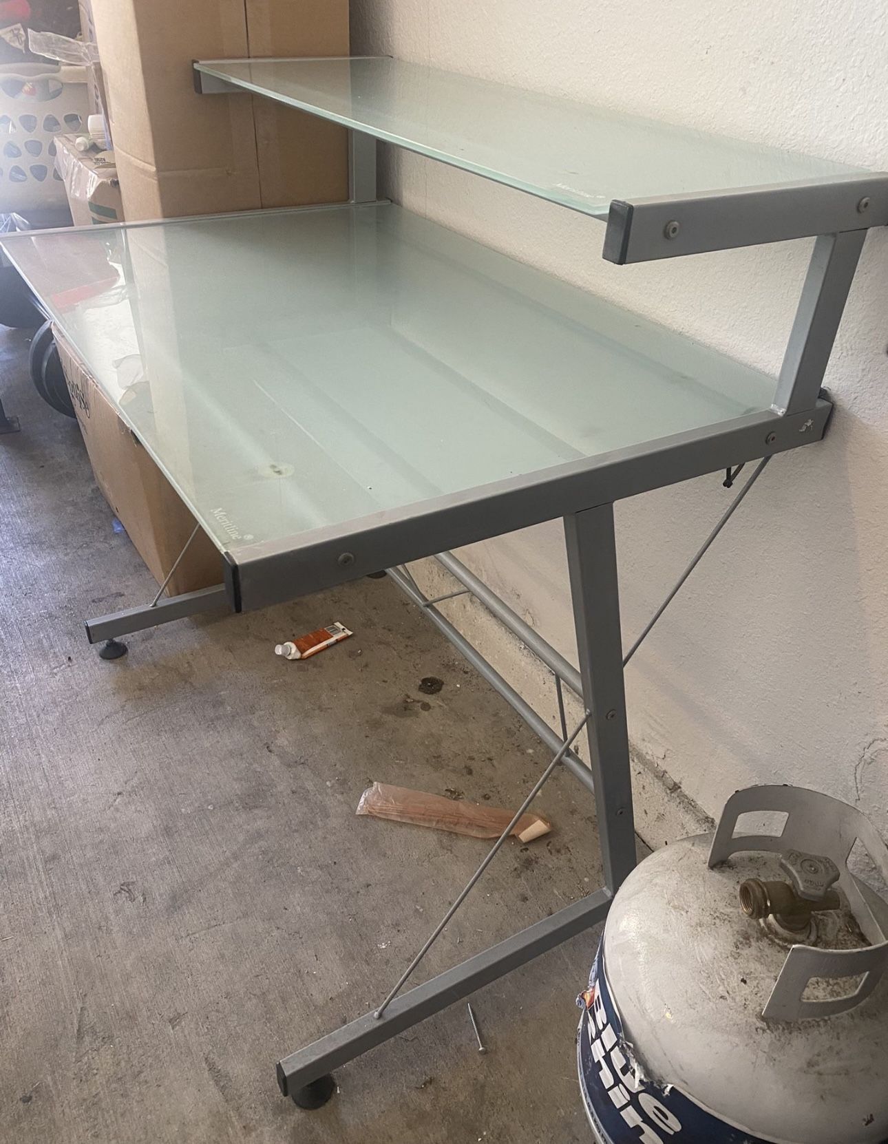 Glass desk with metal frame