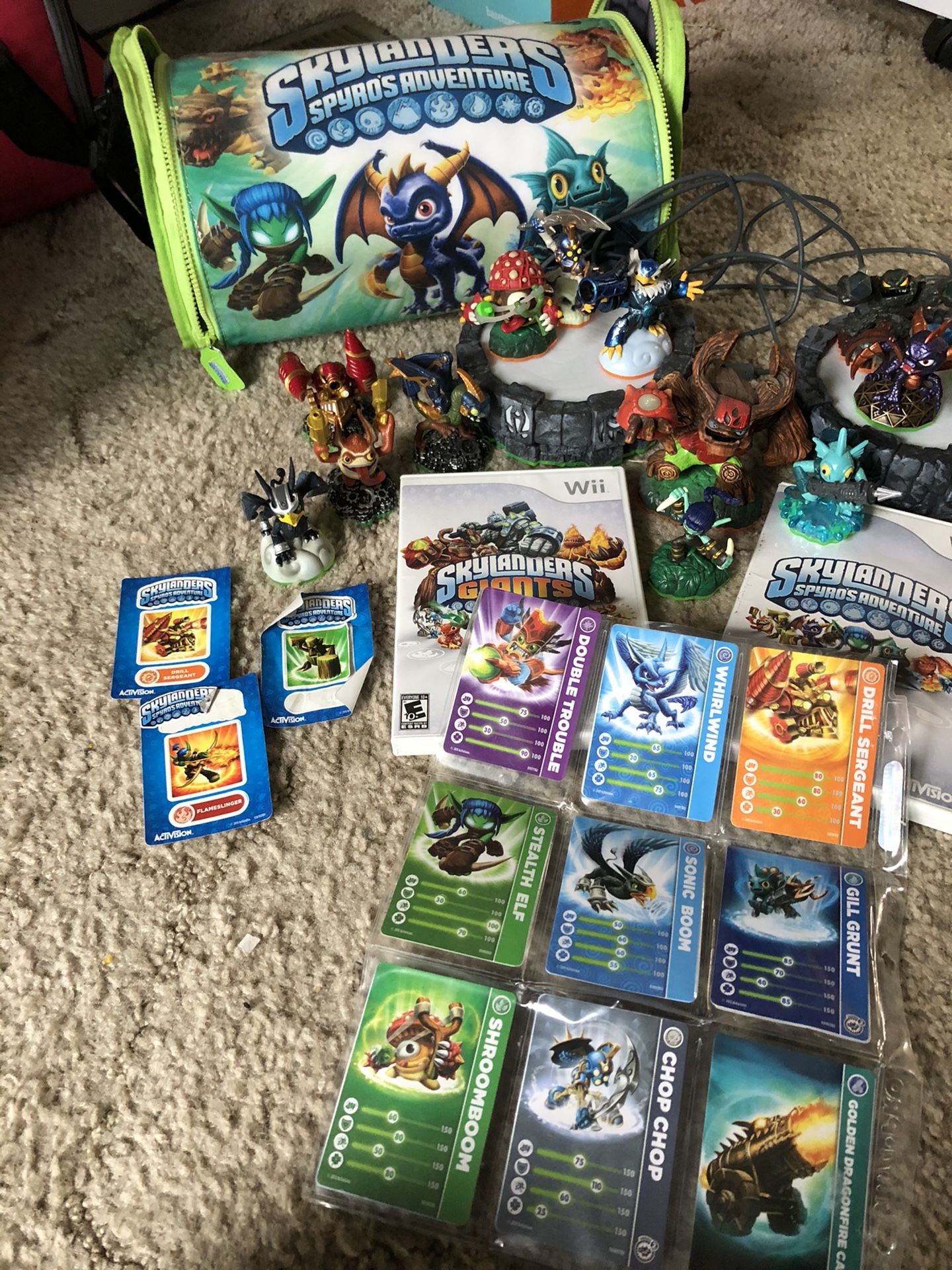 Skylander Wii games and 16 characters with carrying case