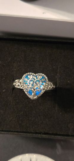 Sterling Silver 925 ring comes in a heart-shaped ring box. Ready for gifting.