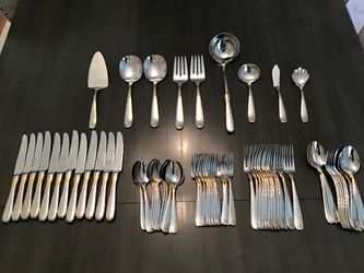 Yamazaki Silverware Set - Complete 69 piece set in Mint condition. There are 12 complete sets. These sets sell for $80 per 5 piece setting on replacem