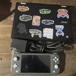 Nintendo Switch Lite And Laptop