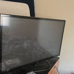 A Tv , A Juicer and a Dresser Drawer 
