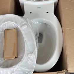 Brand new American Standard Toilet. (no Tank) 