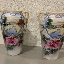 A pair of beautiful antique Royal Nishiki Nippon handled , hand painted 12 “ tall vase roses scenic  This is vintage , hand painted Raise marriage  If