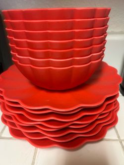 Set of red melamine dishes