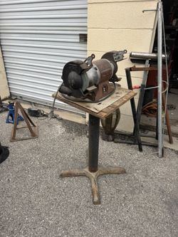 Bench grinder with stand