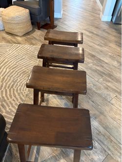 Wooden bar stools.  24 inches tall.  Solid wood, very sturdy.