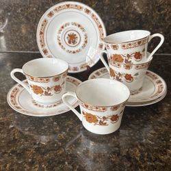 Porcelain Teacups And Saucers