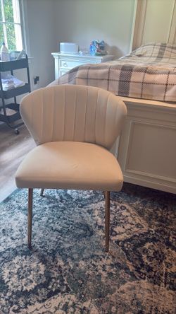 2 cream velvet chairs