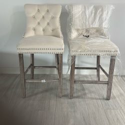 Set Of Two Velvet High stools.