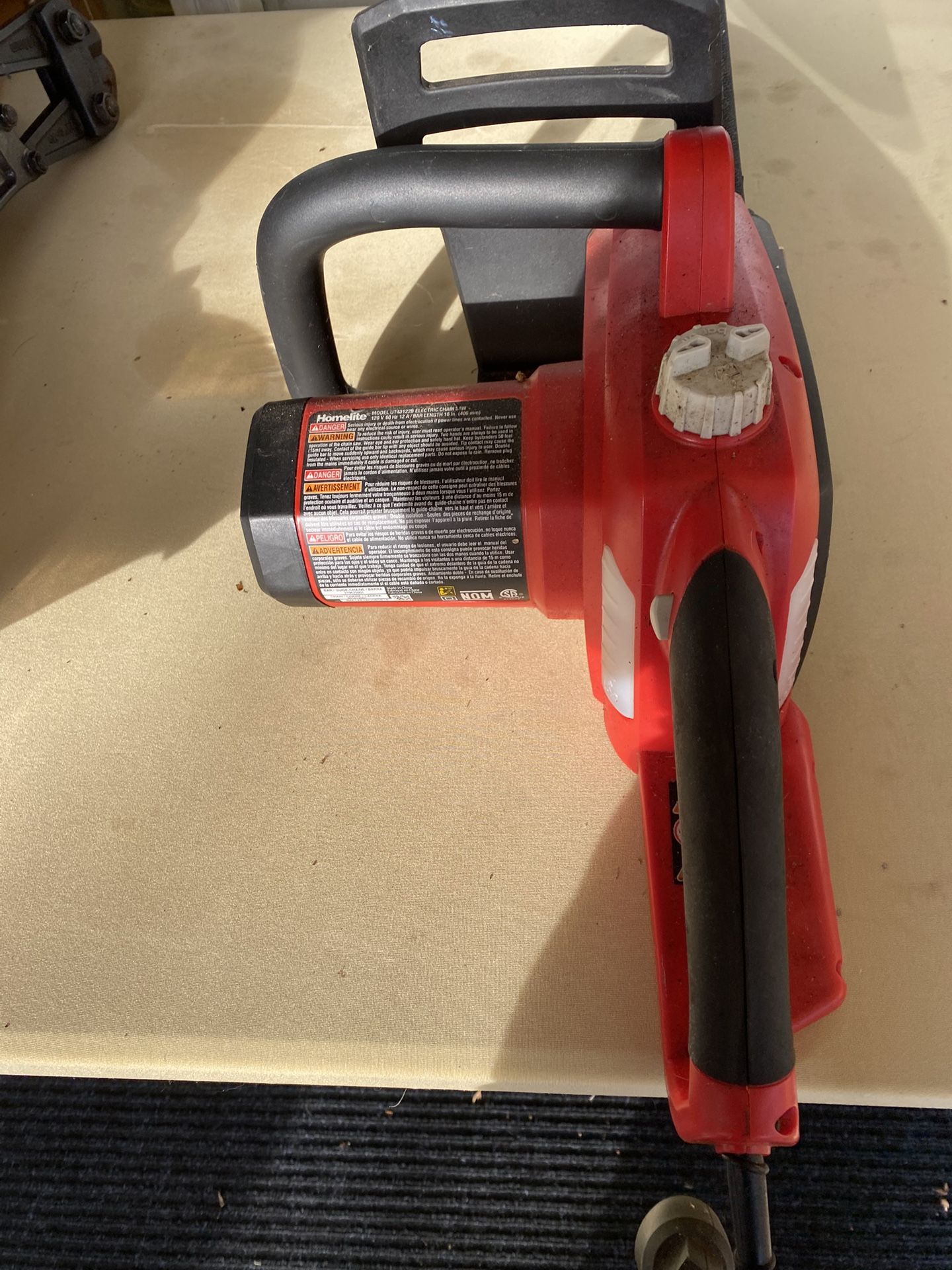 Electric Chain Saw Homelite  Model  UT43122B  Used Twice