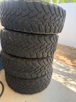 Set of 4 Toyo Open Country M/T tires.