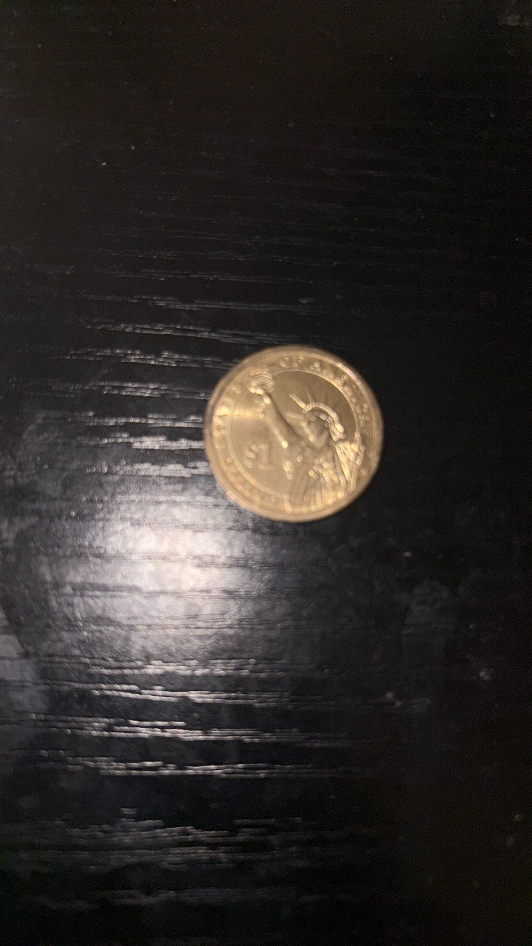 1$ Coin