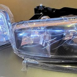 gmc head lights 2000 - 2006