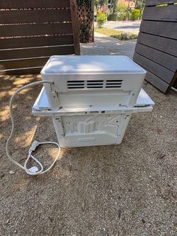 Air Conditioner with Remote. (Home Depot Purchase).