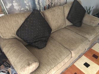 Sofa and 2 pillows