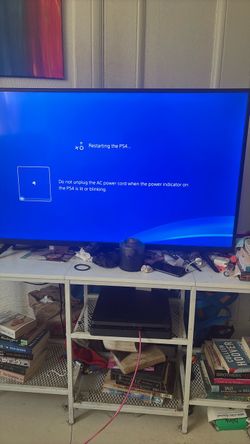PLAYSTATION 4 , BLACK w controller  (negotiable)