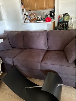 Cindy Crawford sleeper sofa — lightly used