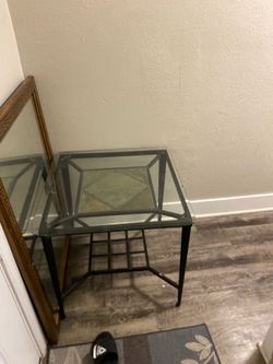 Two glass side tables