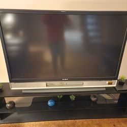 TWO 50 INCH TELEVISION WITH STANDs