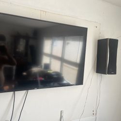 $1400 55 inch television and sophisticated home theater system