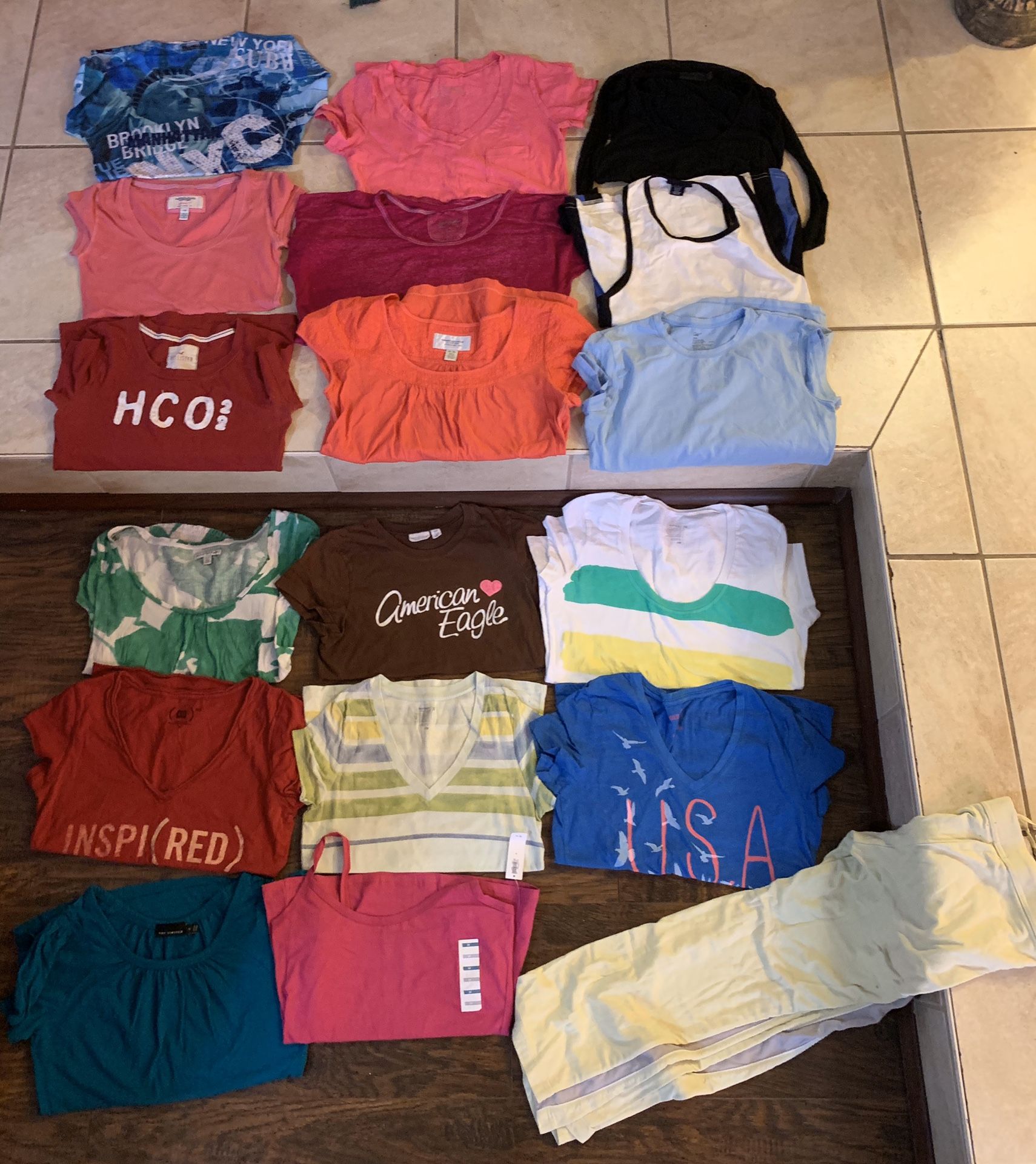 Ladies size small-medium name brand shirts