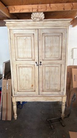 Distressed White Wood Armoire Cabinet