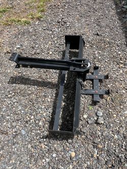 Heavy-duty tractor or UTV/ATV scraper blade attachment, Brinly Model 38, designed for grading and leveling tasks.