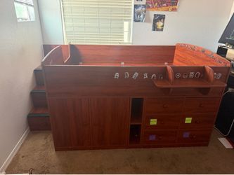 Full wooden child’s bed frame (no mattress)