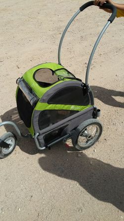 doggy ride brand of stroller. Has so you can put it on your bike like a trailer