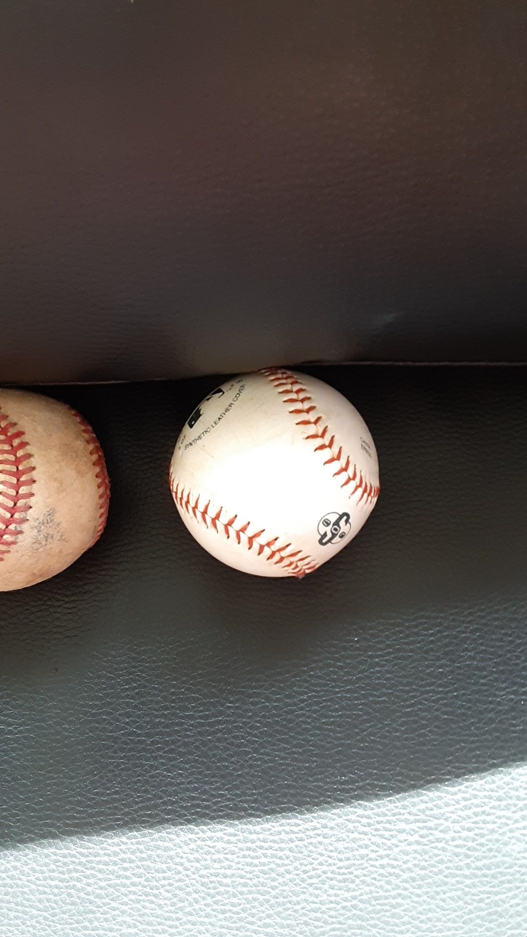 4 baseball balls