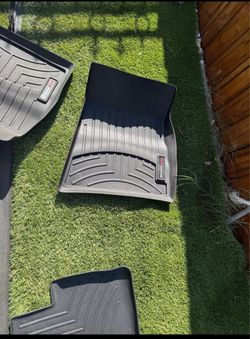 Weather tech floor mats/ sunshade tesla model 3